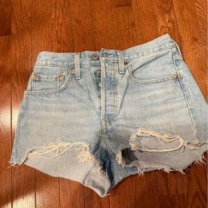 Levi’s 501 Light Blue Distressed Denim Shorts